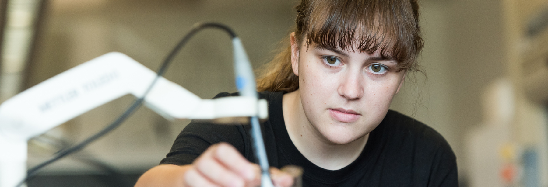 student in chemistry lab