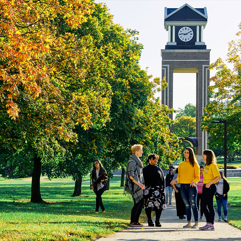 Students standing in front of the missouri western clock tower