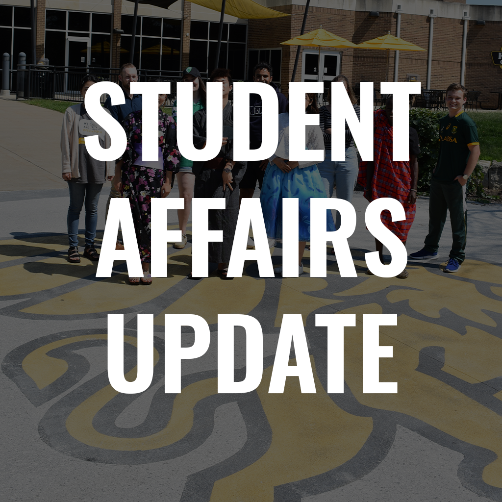 student affairs update cover with international students standing in front of a building in the background
