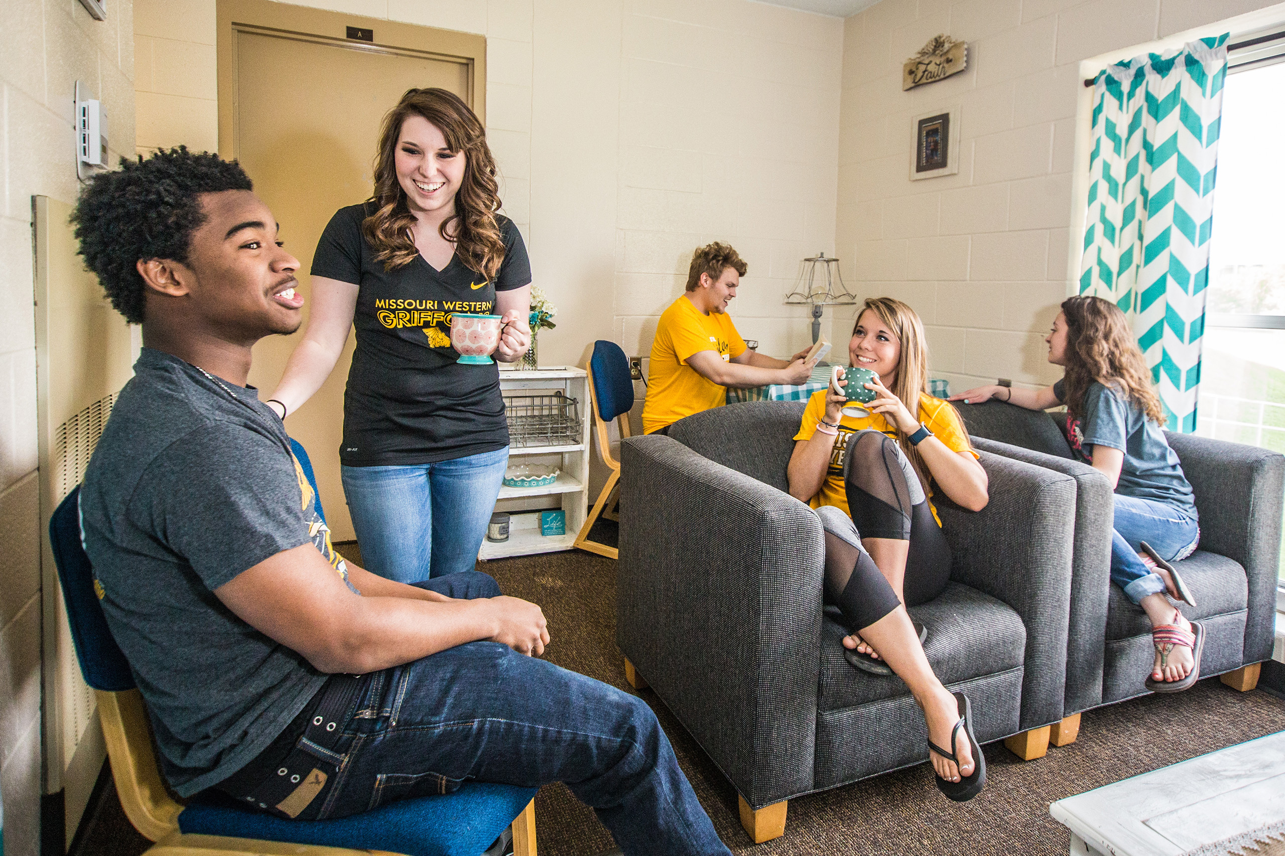 five students in res hall room
