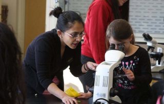Dr. Roy working with child