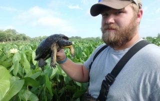 OLYMPUS DIGITAL CAMERA Student with Turtle