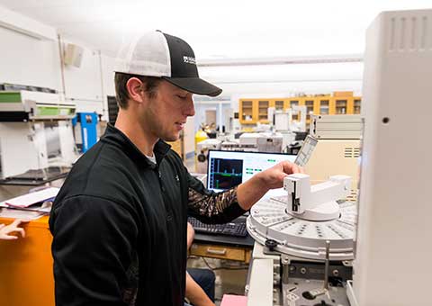 Students work in a medical lab