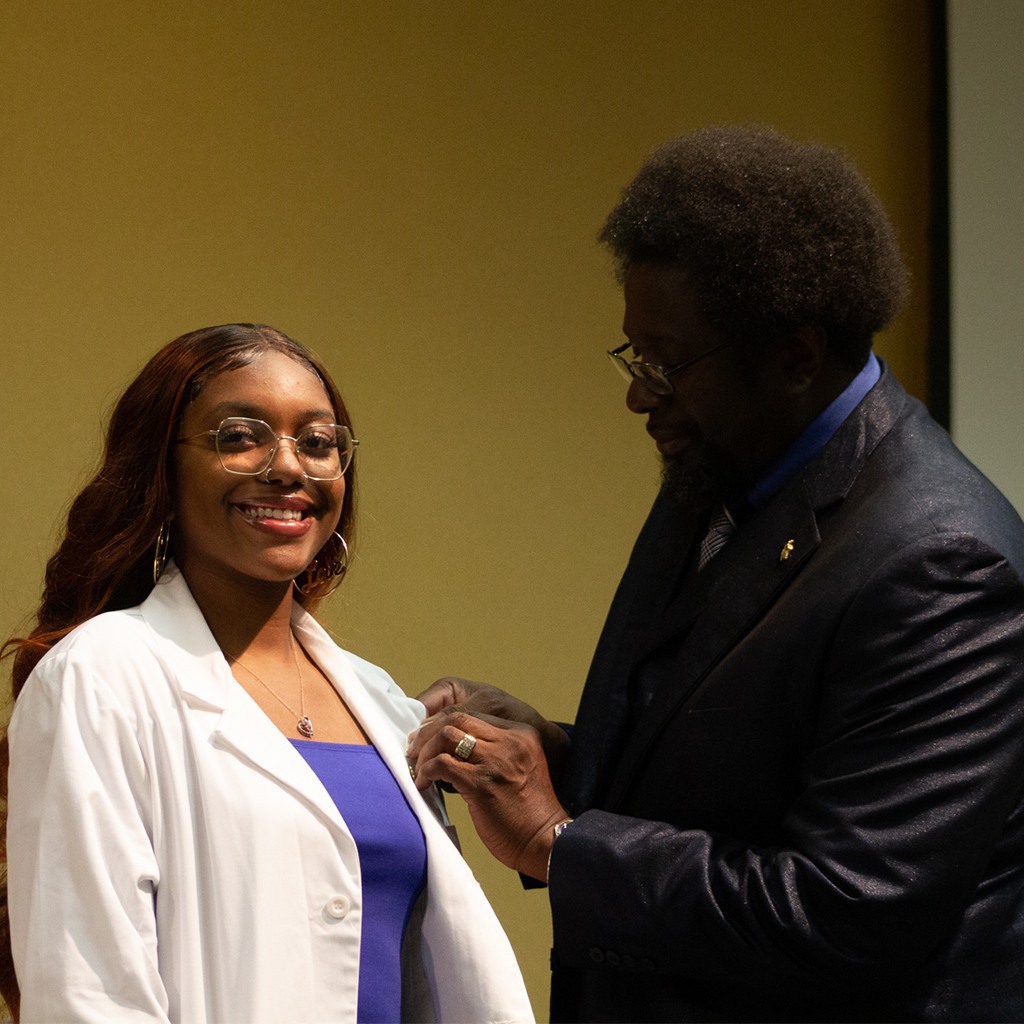 nursing graduate being pinned