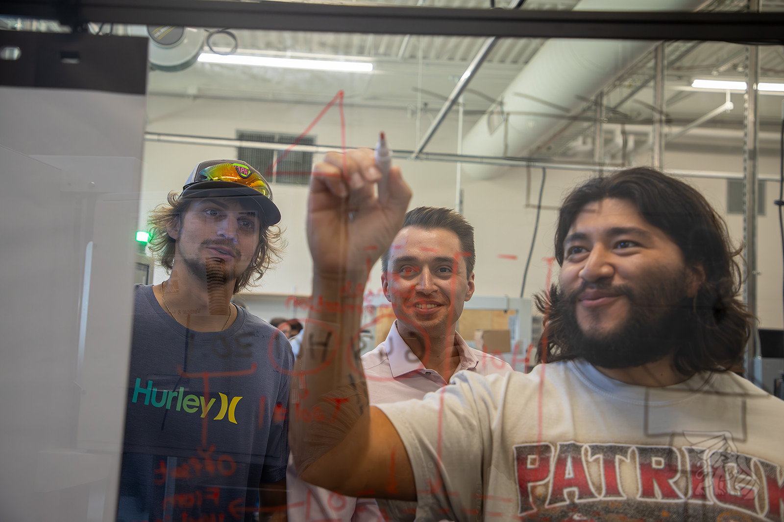Students work in houlne center
