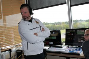 Ryan Menley directs the new  video board in the stadium on game day. 