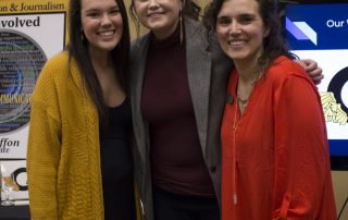 three students presenting work at foundation appreciation reception