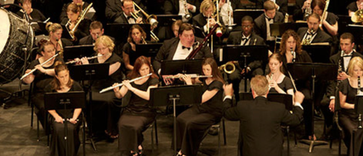 missouri western orchestra performing on a stage