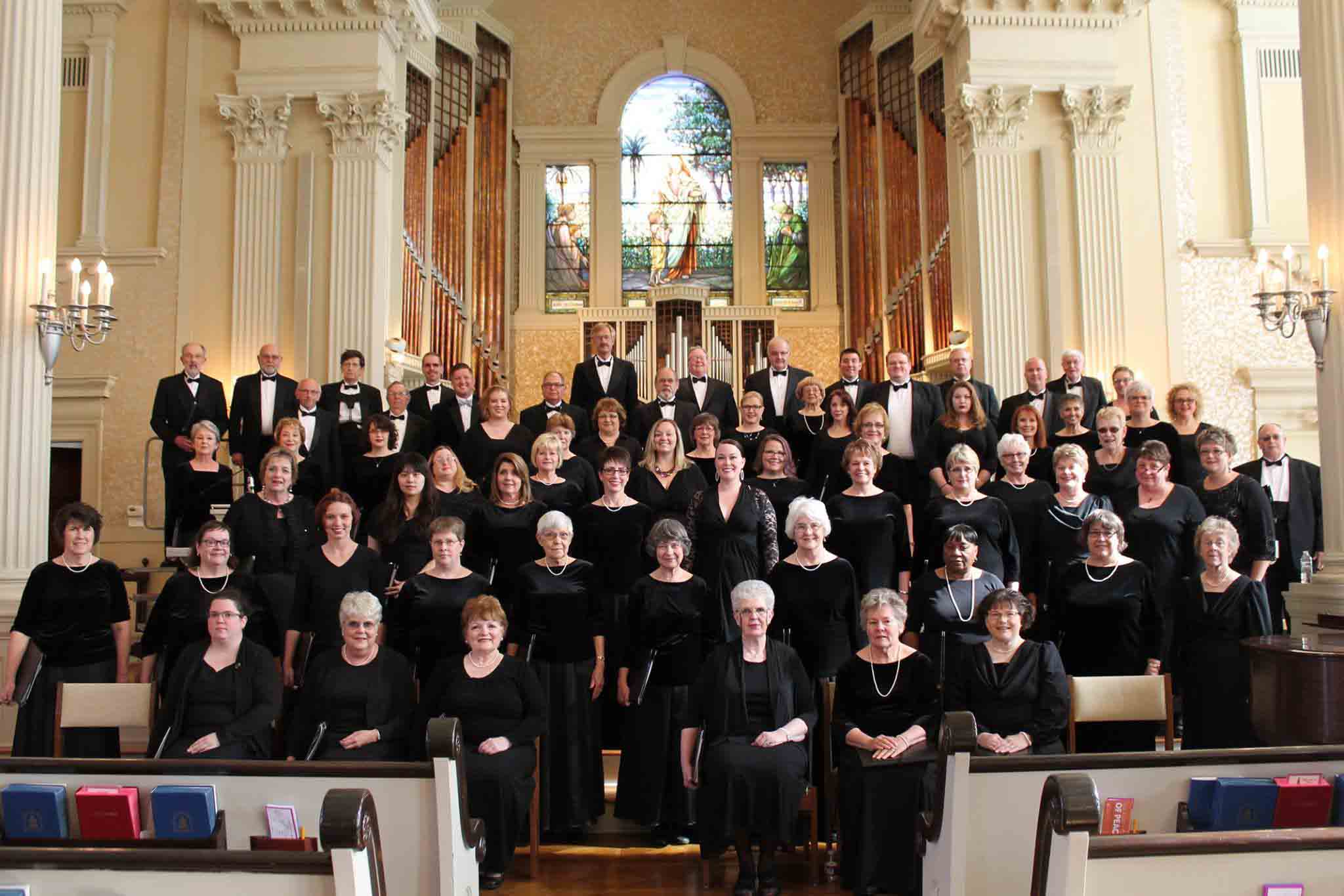 The saint joseph community choir standing in a beautiful church