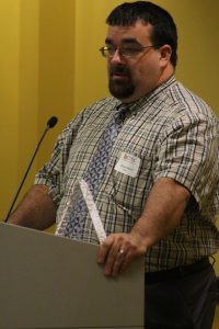 Brenten Davis accepts his Student Excellence Award.