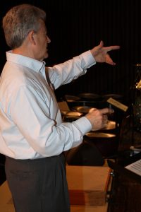 Dr. Dennis Rogers leads a recent rehearsal for eXtreme Percussion.