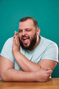 Comedian Daniel Franzese winks at the camera