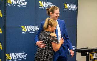 contest winner hugged