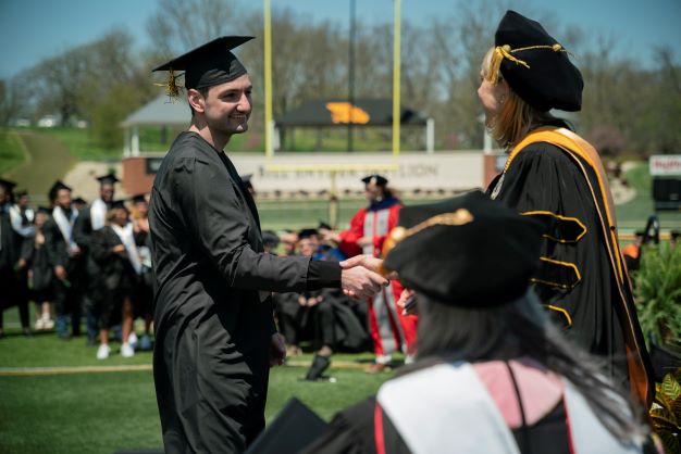 graduate congratulated