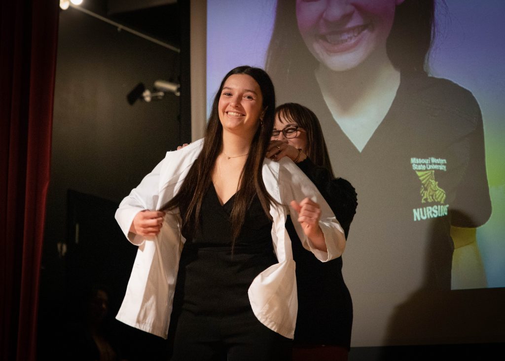 nursing student receives white coat
