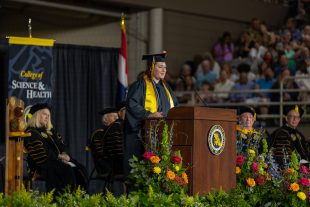 student speaks at commencement