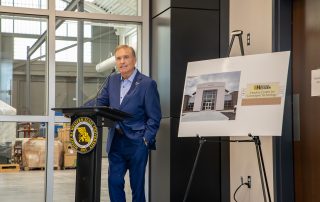 tim houlne at podium