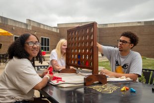 students playing outdoor games mowest