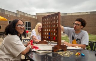 students playing outdoor games mowest