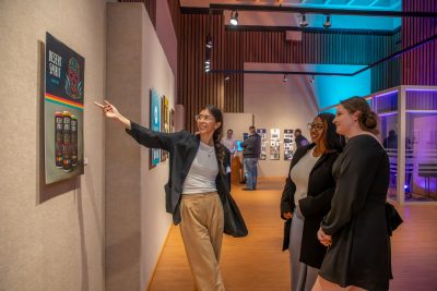 students looking at art in gallery