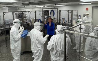 gowned students in technical training center