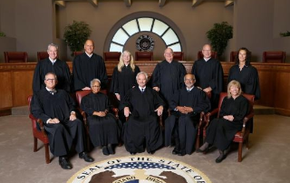 11 judges in courtroom