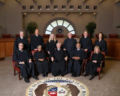 11 judges in courtroom