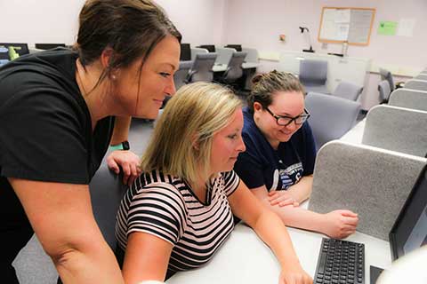 Nursing students working together