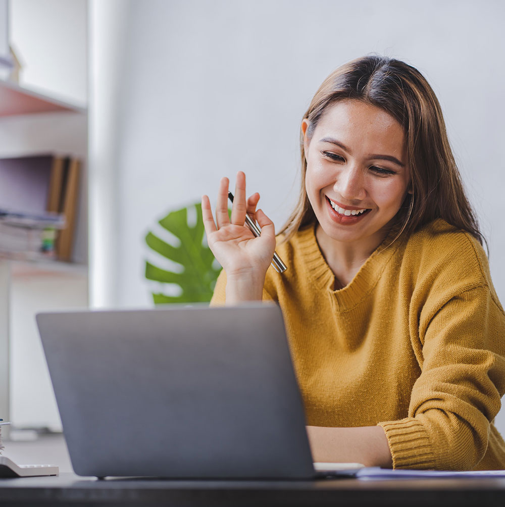Woman on laptop meeting