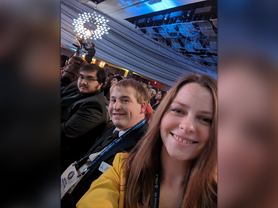 Michael Rader, Seth Hogue and Madi Taylor (l-r) at the 2023 FBLA Collegiate National Leadership Conference.