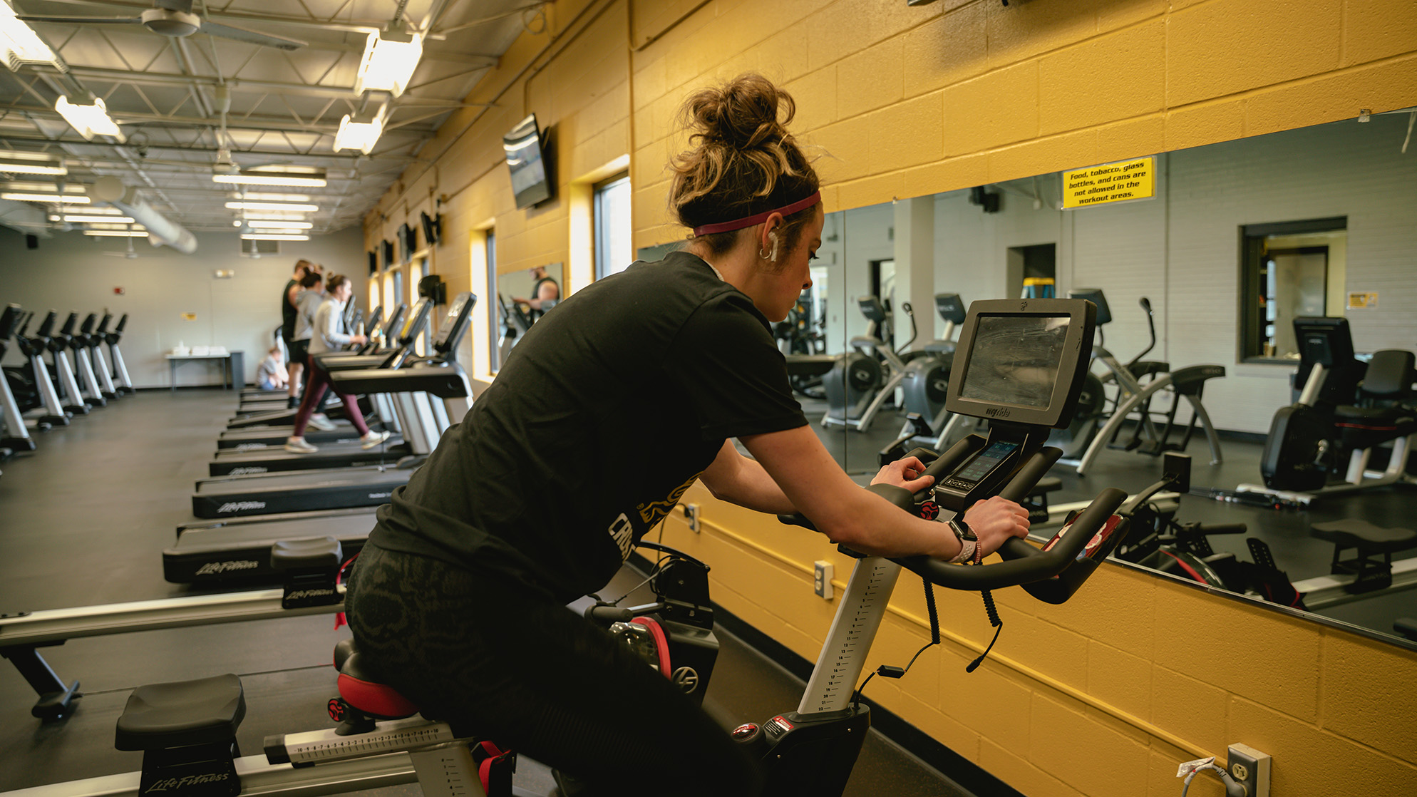 Student working out at Baker fitness center