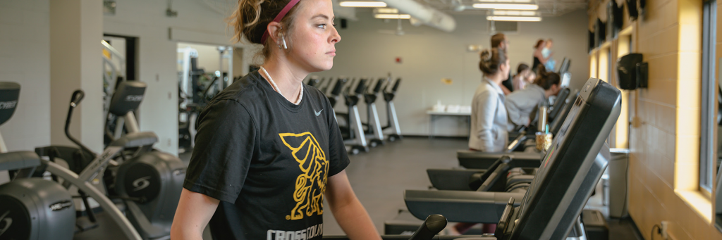 Student working out at Baker fitness center