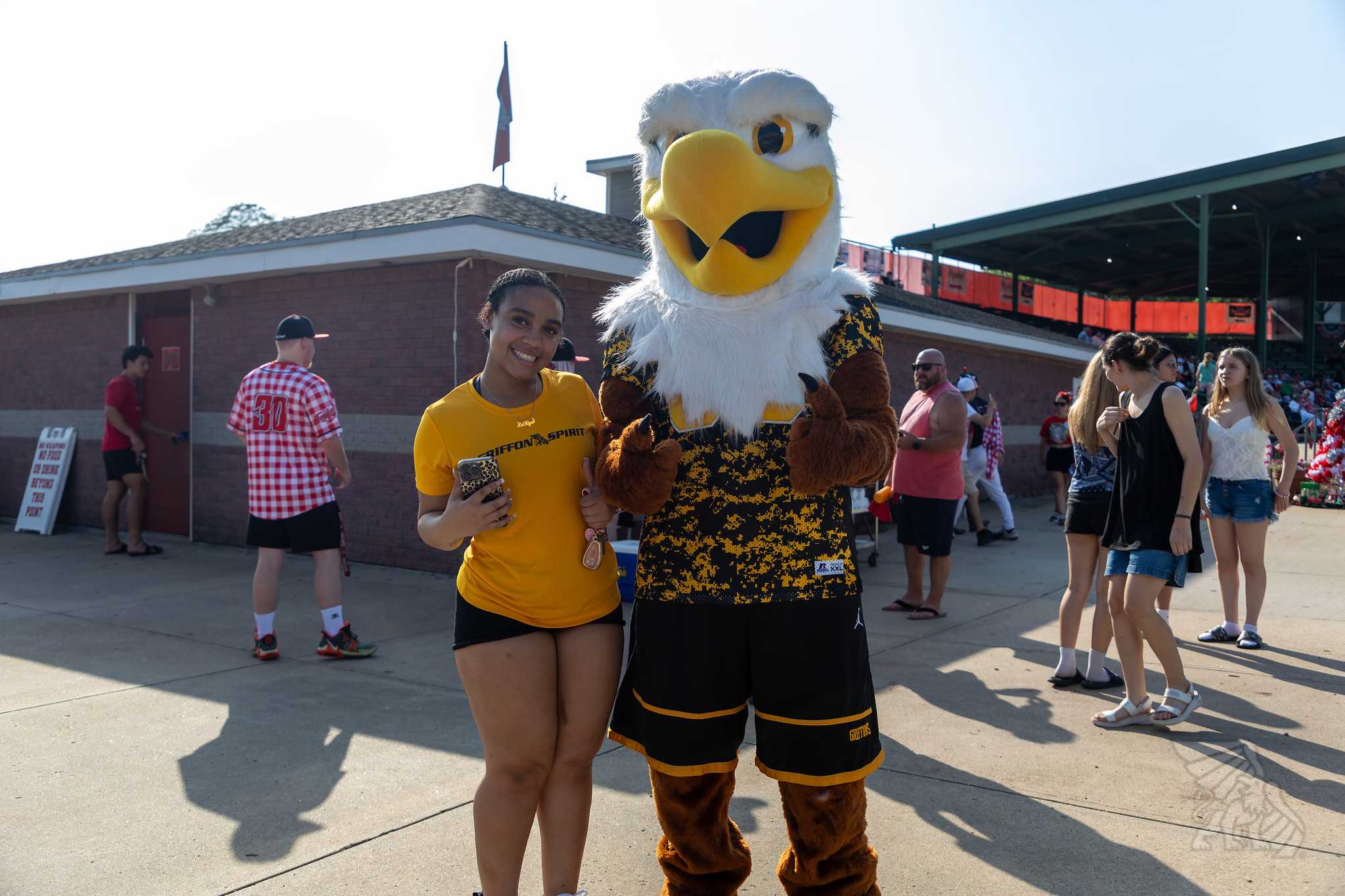 Max and a student smile for the camera