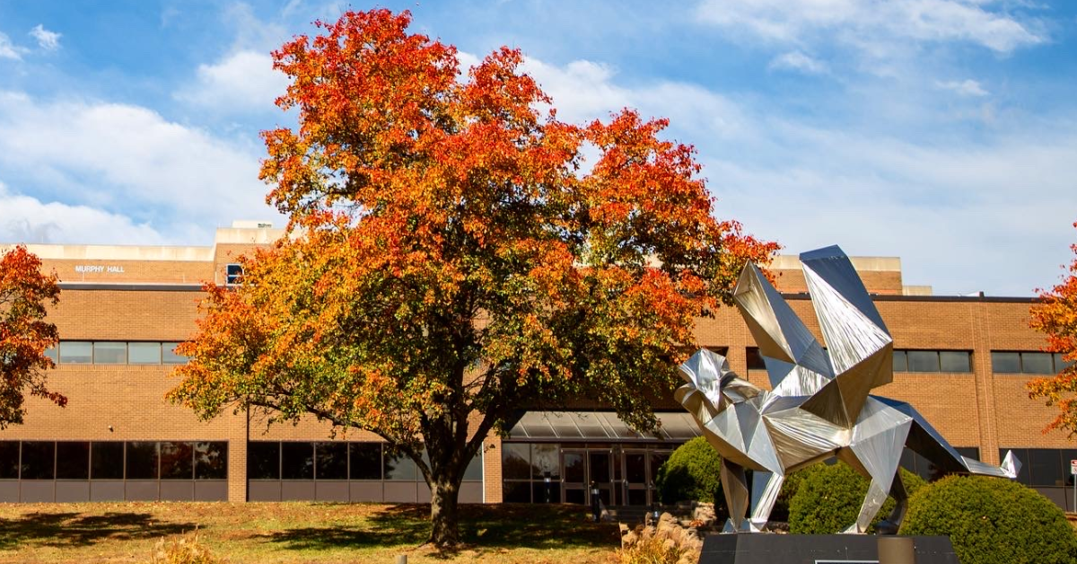 griffon sculpture eder hall fall foliage