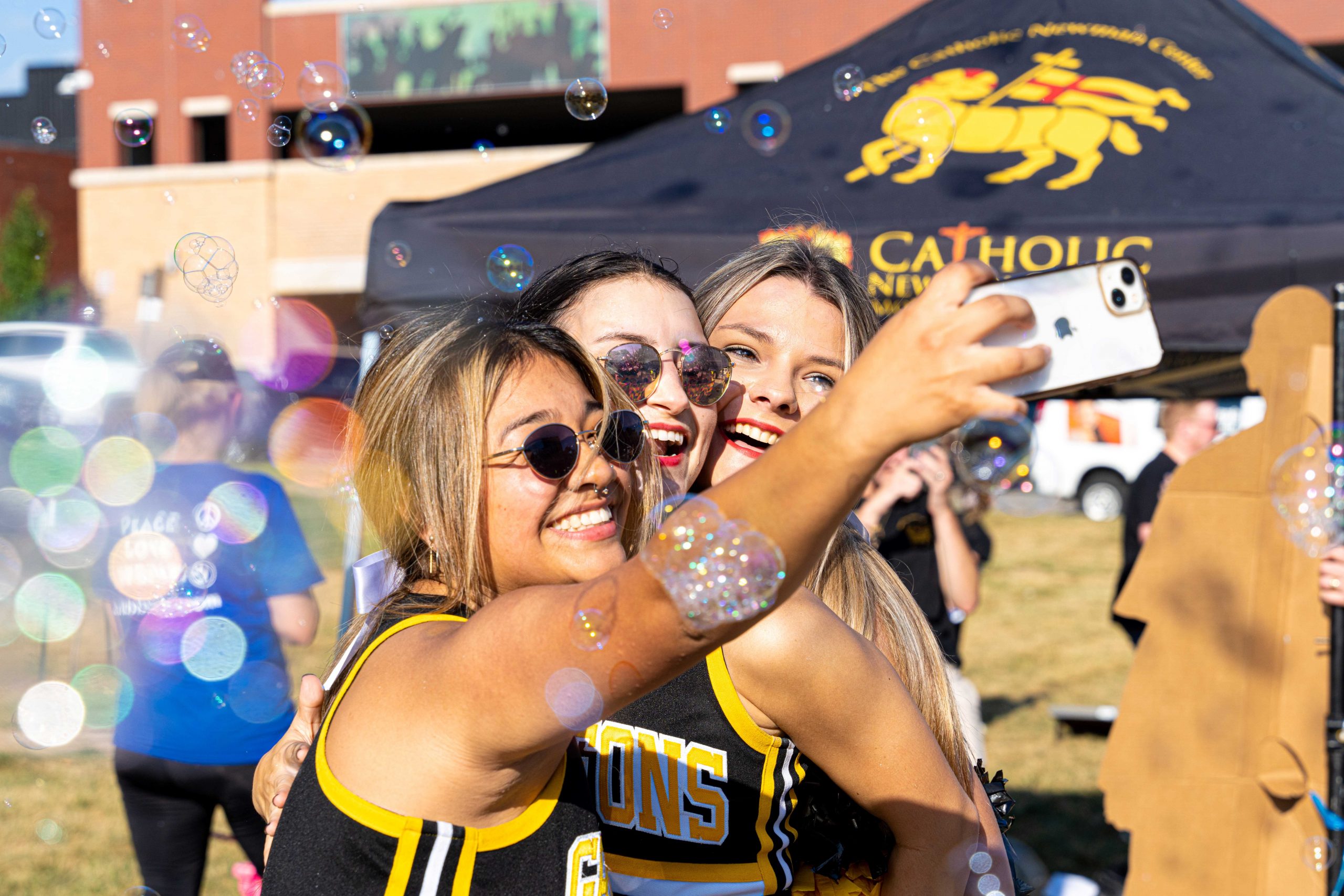 cheerleaders take selfie downtown St. Joseph