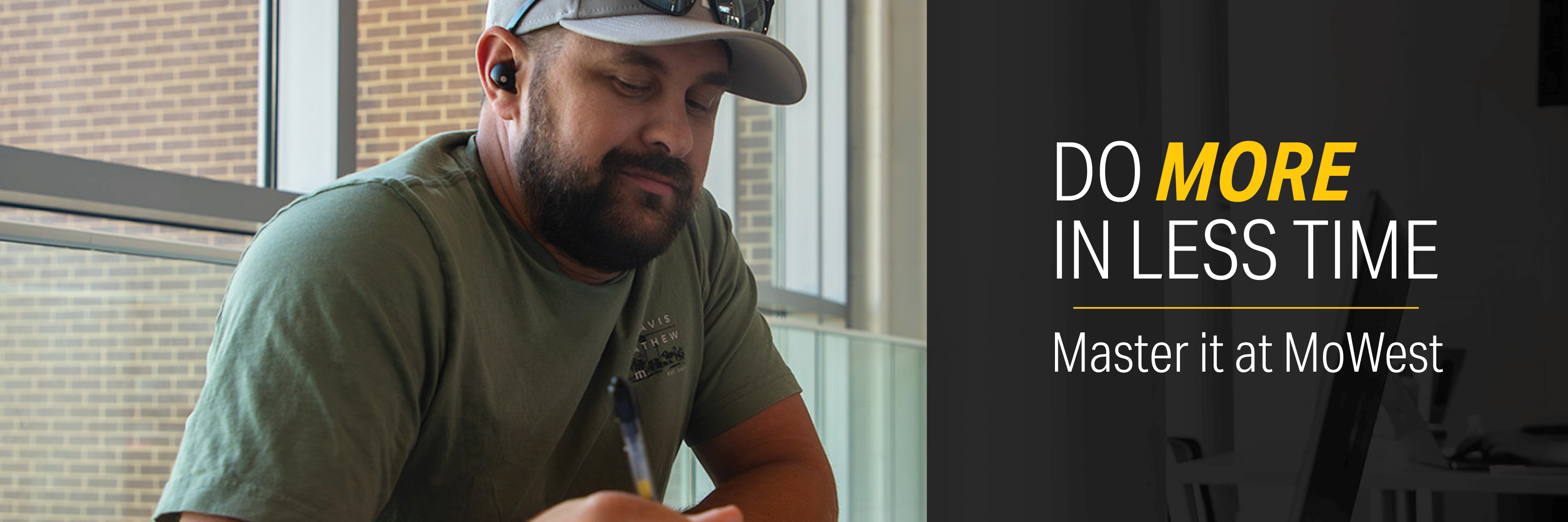 A student sits before a window, smiling as he works at his laptop. Text reads Do MORE in LESS TIME - Master it at MoWest