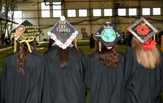 2018 graduates stick with tradition and decorate their caps for commencement day