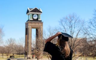 Student looking at clock tower