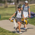 Senior Steffanie Yabut walks to the next hole at a 2017 tournament