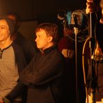 Wil Abeling and Josh Pearson react to the light reflector accidentally being shifted and blinding the volunteer student. The Motion Picture class gets to spend hours in the studio perfecting lighting styles and techniques.